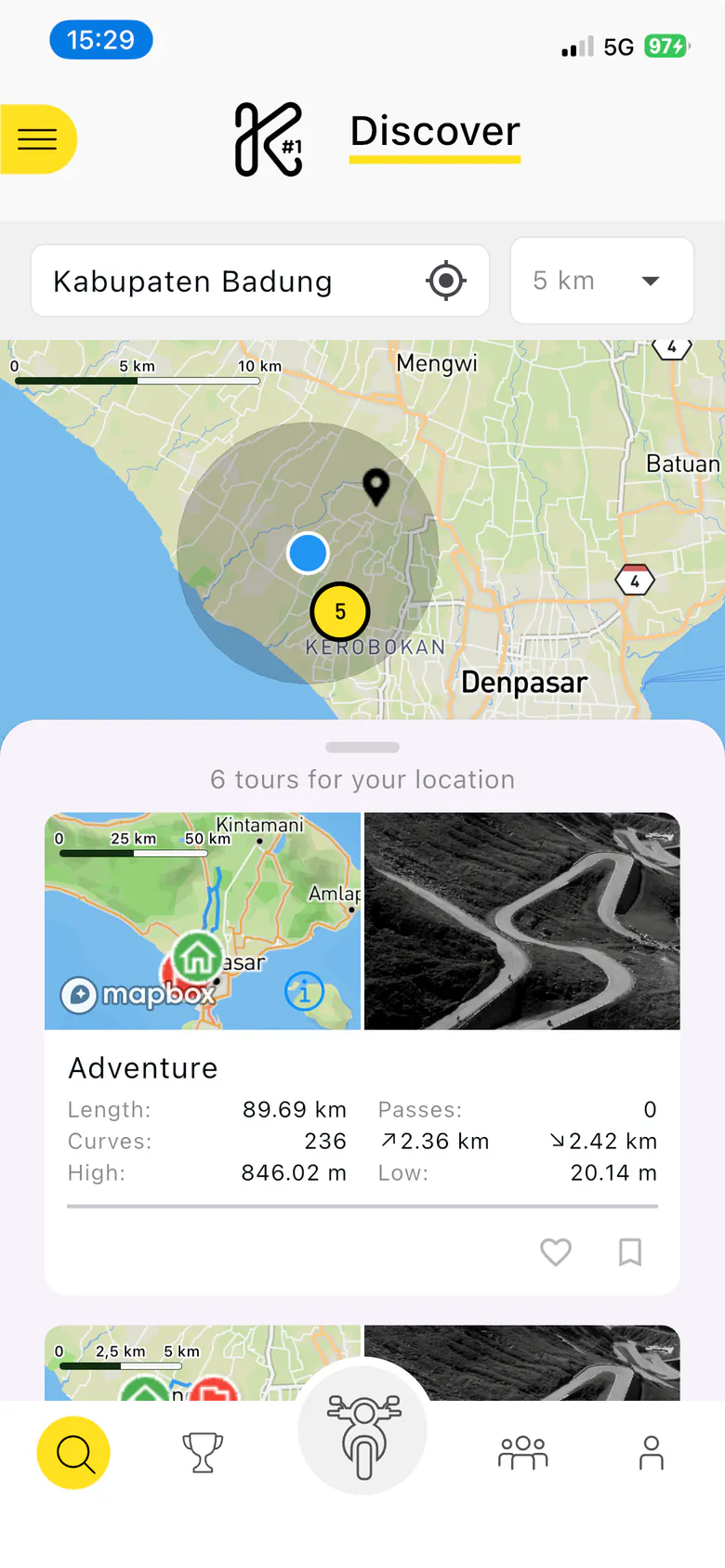 Old Discover tab: a map of Badung, Bali with a 5 km search radius and a tour-count marker, above a sheet listing six tours for the location with a preview map, a photo, length, curves and elevation.